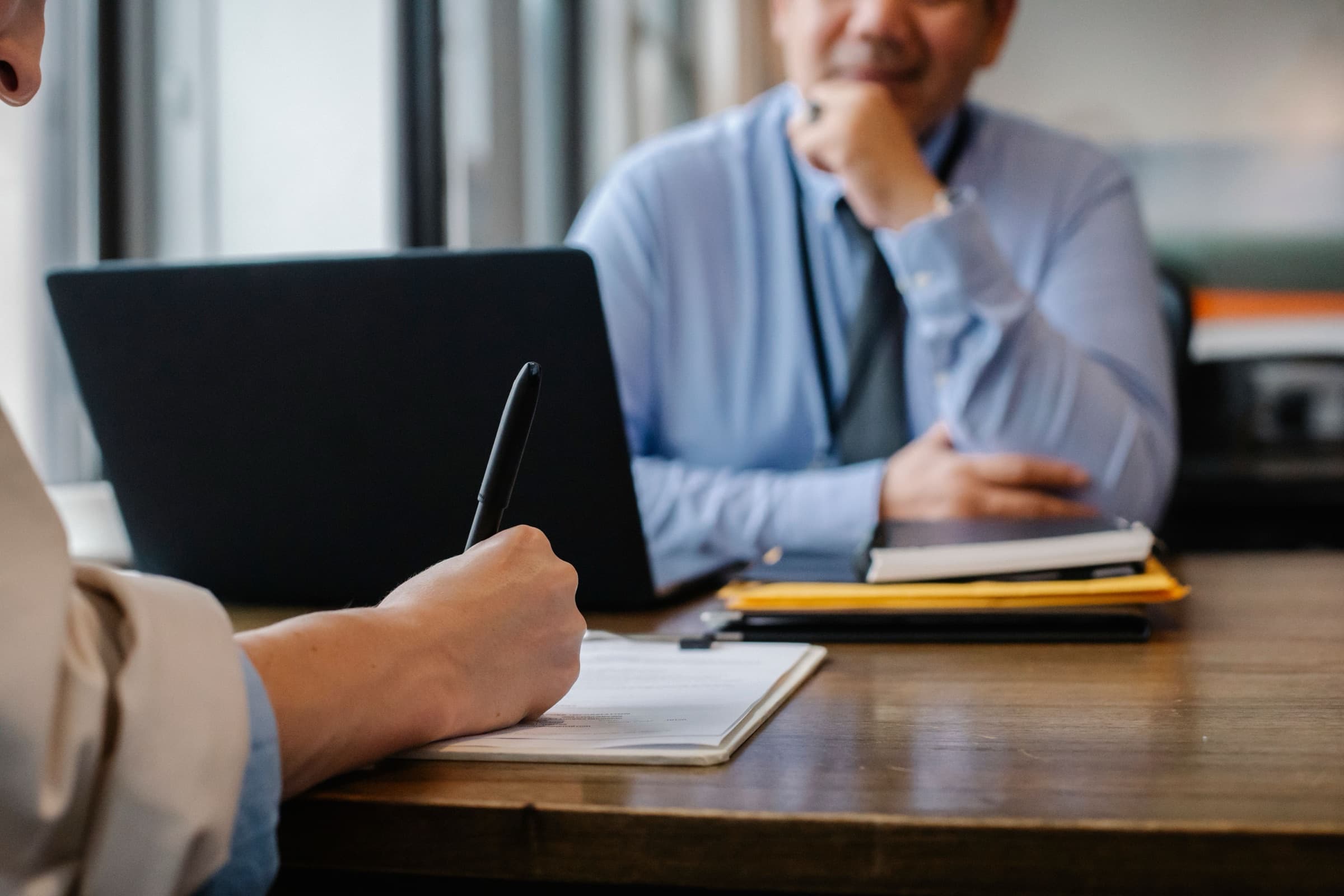 Education and student visa counselling in Kuala Lumpur, a Hays adviser works through an application with a Malaysian student